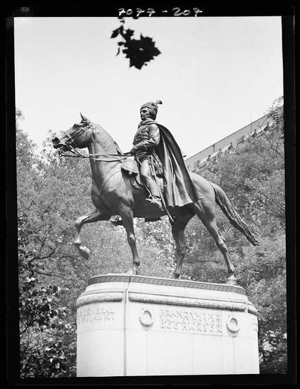black and white photograph of a statue showing an equestrian figure on horseback with the caption "General Putnam's Corpse Guard" engraved below. The image also includes text at the top left corner, possibly indicating metadata or cataloging information such as "Z7-26-1930," suggesting that it may have been taken in a public space during 1930 and was part of a collection identified by this code. There is no visible damage to the statue itself from direct exposure but there are signs of aging, like discoloration or erosion on the surrounding structure.