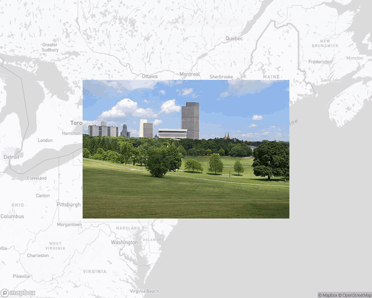 A photo of or from a park from the linked website, overlaid on a cropped world map where it's located.