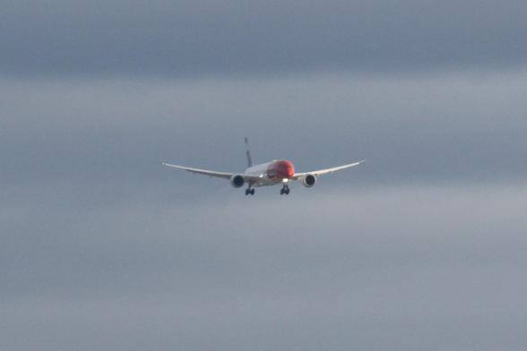 Boeing 787-9 Dreamliner in red-nosed Norwegian livery on final approach to Runway 28L at Portland International Airport PDX. This plane will be repainted in the Boeing Portland Paint Hangar to Lufthansa livery.
photo by Ian Kluft
December 11, 2025
Portland, Oregon, USA