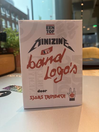 Complementary mini zine with band logos, and cover set in (spoof) versions of fonts used for and derived from band logos.