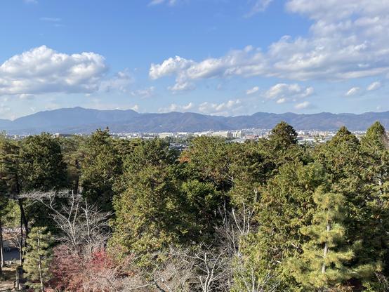Looking across Kyōto from the Eastern Mountains (東山). Mt. Atago on the left side is the tallest peak in the city.