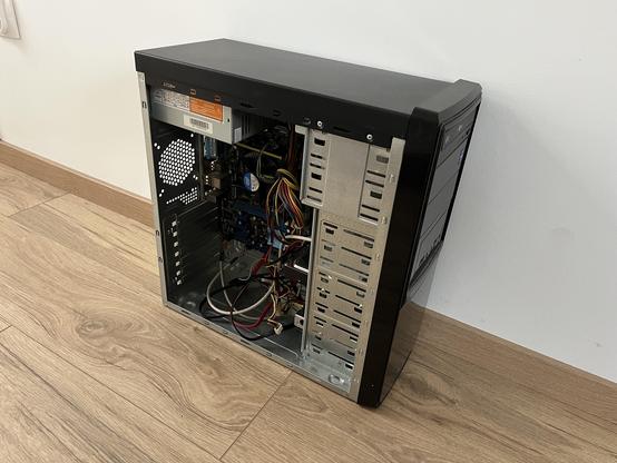 A tower PC computer with side panel open