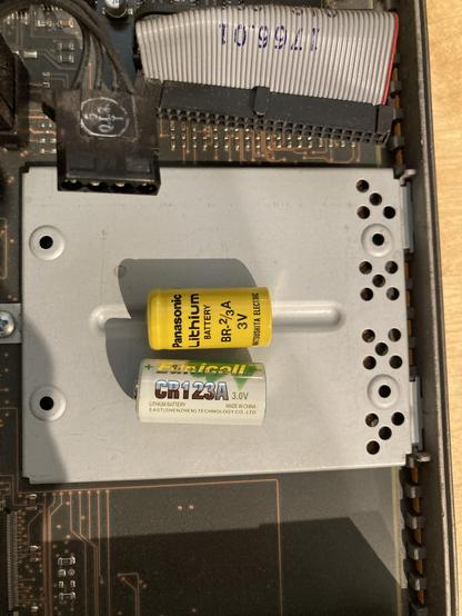 A side-by-side comparison of a Panasonic Lithium BR-2/3A and generic CR123A battery. Both show the same voltage and dimensions.