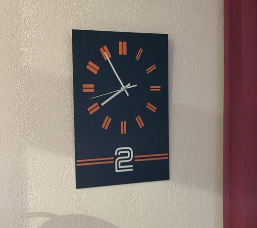 A wall clock designed like the 1980s BBC 2 logo.