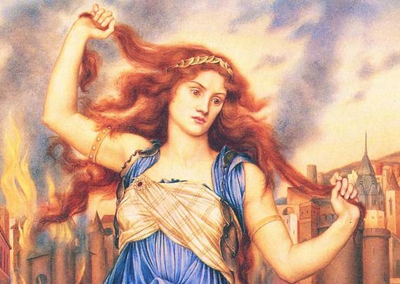 A Pre-Raphaelite oil painting titled "Cassandra" by Evelyn De Morgan (1898). It depicts the Trojan princess Cassandra standing in the foreground with a look of anguish, tearing at her long, red hair with both hands. She wears a blue, draped robe over a white garment with gold details. In the background, the city of Troy is consumed by flames and smoke, signifying the destruction she prophesied but was cursed to never be believed. De Morgan, E. (1898). Cassandra [Oil on canvas]. The De Morgan Foundation. https://www.demorgan.org.uk/collection/cassandra/
