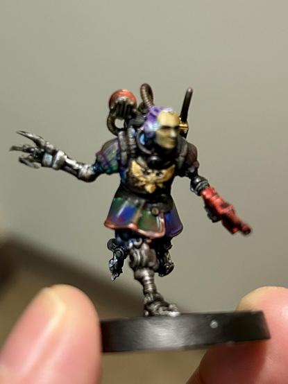 A android in renaissance style clothing bright colors contrasting with his mechanical forms