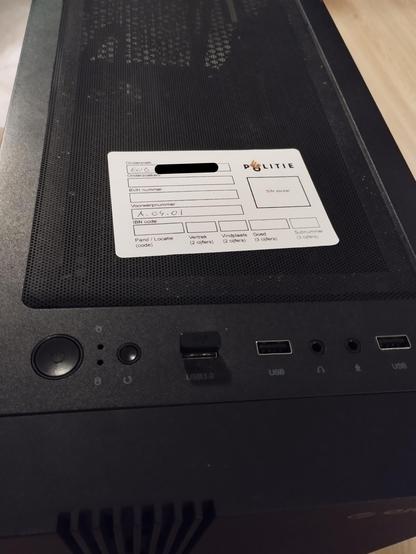 A tower PC with a similar Politie sticker