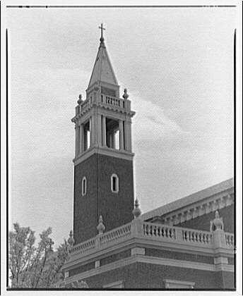 The image depicts a bell tower from the Georgetown Preparatory School, possibly dating back to around 1920-1950. The photograph is in black and white and shows the structure of the building with its ornate details.
In terms of visual elements:
* A prominent feature of the photo is the bell tower which has a steeple-like top adorned with crosses at different heights, indicating religious affiliation likely to Catholicism due to the presence of Christian symbols like cross.
The body part that forms this image consists of multiple columns. The first column (from leftmost) shows up from about 12% in height and stretches almost halfway down, while subsequent bodies are less prominent but also visible within a very narrow vertical range on either side of the center structure.
Additional information suggests Horydczak as an individual associated with this photo - perhaps its photographer or someone involved directly with capturing it.