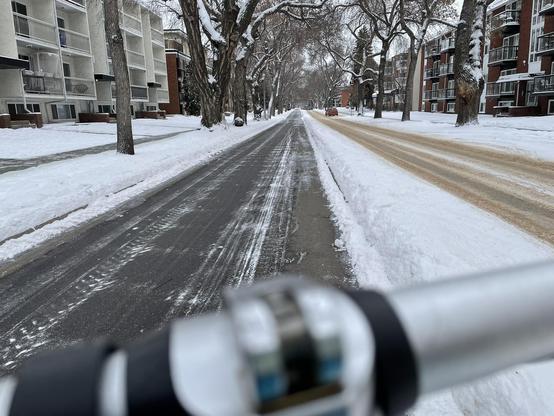 The sheltered bike lane on 83 Avenue is beautifully clear, navigable with studded tires.