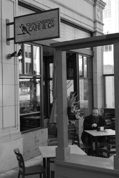 A shot of a cafe that had this dude framed, rather literally, in an interesting way.