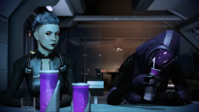 Screenshot from Mass Effect 3: The infamous scene of Tali getting drunk about issues with parents, and how different daughters solve it differently (Tali on the right), with my fem coded Rue Shepard sitting beside her and looking on with concern.
Rue has silvery hair with shaved sides, glowing red on black eyes, black lipstick, and wears a black, tight catsuit.