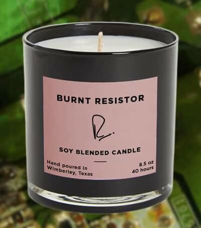 A candle labeled "Burnt resistor. Soy blended candle"