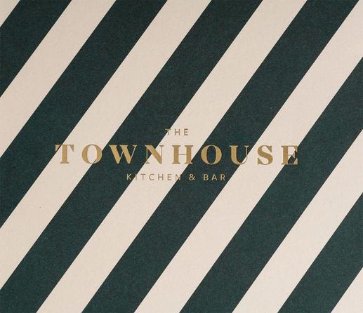 Elegant logo for "The Townhouse Kitchen & Bar" set against a backdrop of dark green and cream diagonal stripes.