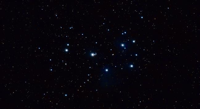 A starry night sky filled with numerous bright stars against a dark background, showcasing various star patterns and clusters.