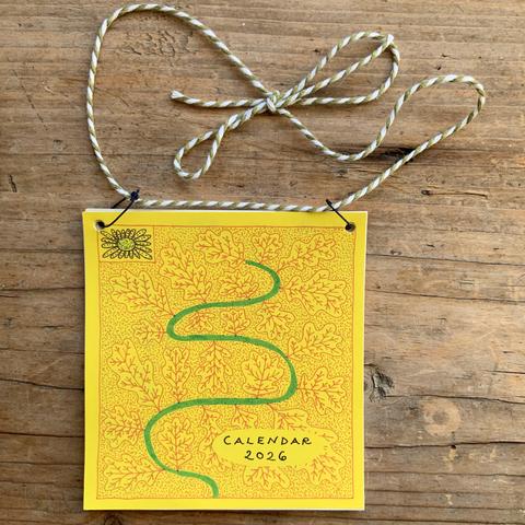 Here is the cover of the calendar again but printed on yellow paper.