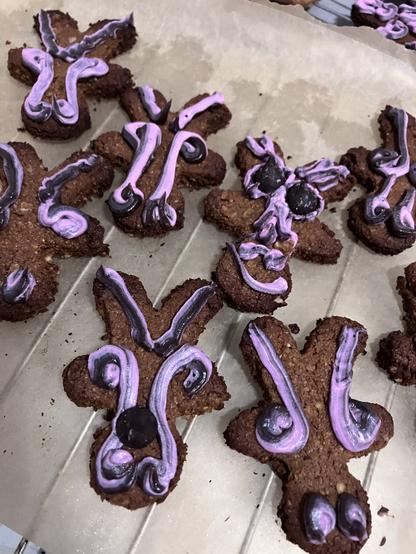 6 gingerbread cookies inverted to be decorated as reindeer heads looking a bit darker than intended…