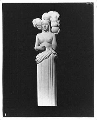 This image features a black and white photograph of a sculpture titled "The Fire" by Theodor Horydczak, created approximately between 1920-1950. It's placed against a plain background which accentuates the subject matter.
In this sculpture, we see an elegant female figure with flowing drapery that seems to represent fire or movement, as it swirls around her form and hair in dynamic poses suggesting flames or waves of wind. The statue is sculpted from what appears to be marble or another type of stone, giving a sense of solidity and permanence despite the fluidity suggested by its design.
The sculpture's title "Fire" implies that this piece may have been commissioned for symbolic reasons related to themes like resilience, renewal, or transformation associated with fire. The overall aesthetic is one of classical beauty combined with an abstract interpretation of motion and energy.