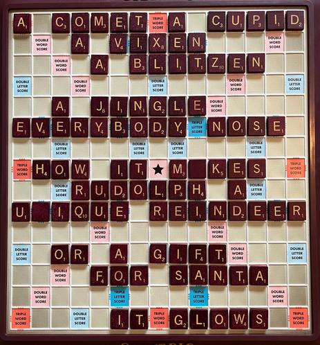 Scrabble board showing Scrabblegram (100 tiles):
A Comet, a Cupid
A Vixen, a Blitzen
A jingle everybody "nose"
How it makes Rudolph a unique reindeer?
Or a gift for Santa?
It glows!
(Blanks: A, N)