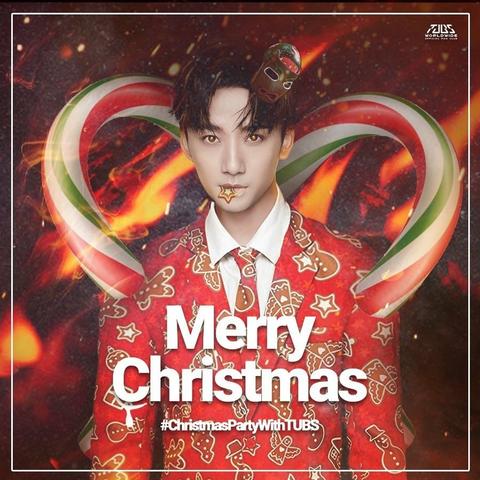 Li Bowen as some kind of Christmas treat zombie: he is wearing a red suit and tie with a pattern of gingerbread cookies, two gigantic candy canes are coming over his shoulders like wings, and there are flames behind him. His skin has an undead pallor to it; his pupils are golden and reflective. There is a weird demonic mask sitting in his hair, about the size of a potato.