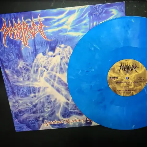 The blue vinyl edition of new Degraved LP 'Spectral Realm of Ruin' and its bluish sleeve with ghostly art and band logo in red