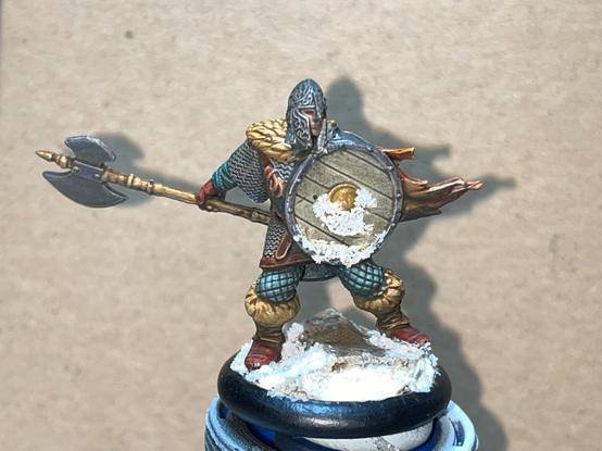 Miniature is the warrior hero from the Dark Souls board game (Steamforged), rebased onto a scenic base by the now-defunct Secret Weapon Miniatures.
Zenithal primed/undershaded black to grey to white, followed by a white drybrushing in certain spots.
Most of the basecoating was done with SpeedPaint markers (Army Painter). All of the miniature was painted with SpeedPaints, other than the snow effects.
Shaded with Sepia Game Wash (Vallejo).
The snow effects are a combination of Frost FX (Vallejo), and Battlefield Basing: Snow (Army Painter).