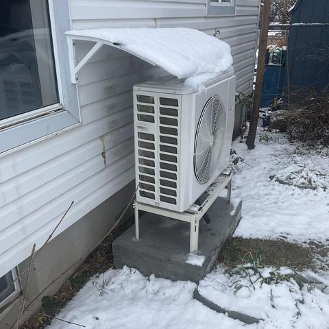 Midea minisplit heat pump outdoor unit.