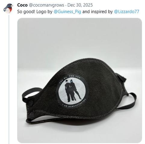 Image of the logo (see other image & corresponding alt text) affixed on a respirator.