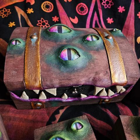 A wooden chest with eyes and teeth