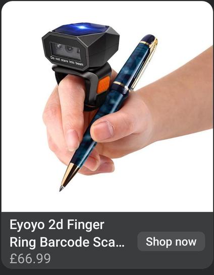 An eBay thumbnail as for an "Eyoyo 2d Finger Ring Barcode Scanner", for which you can Shop Now at the bargain price of a mere £66.99. The photo shows a hand holding a green marbled ballpoint pen, while on the index finger roosts a normally sized barcode scanner masquerading as a massively oversized, boxy ring. Huzzah.