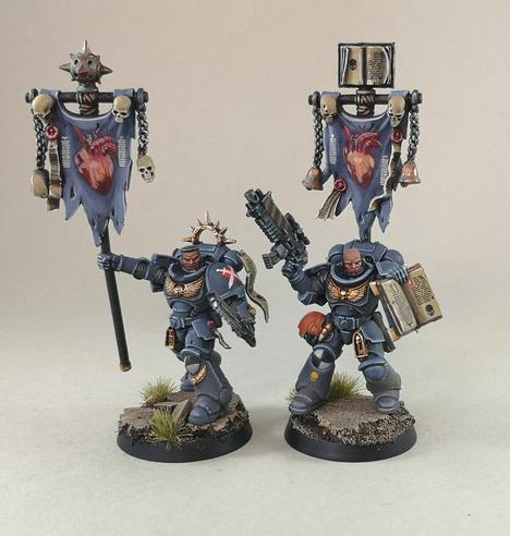 Two of my custom chapter KillTeam 'Warders of the Emperor's Heart', with banners featuring freehanded anatomical hearts