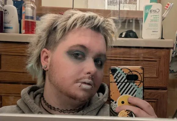Vinny selfie with heavy makeup.