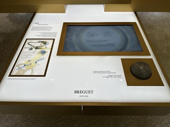 Panel explaining how Breguet invented tourbillon and how it works.