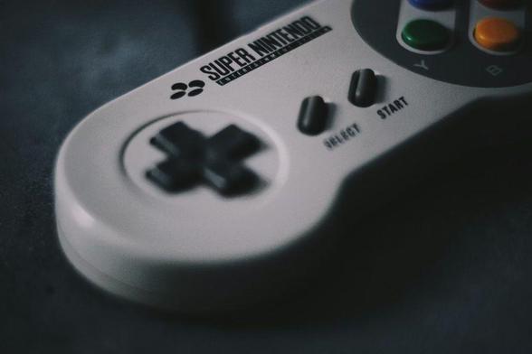 Close up of a Super Nintendo controller.