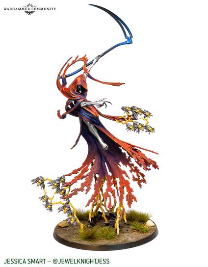 A silver skinned god being in a long purple and red shroud, with a scythe