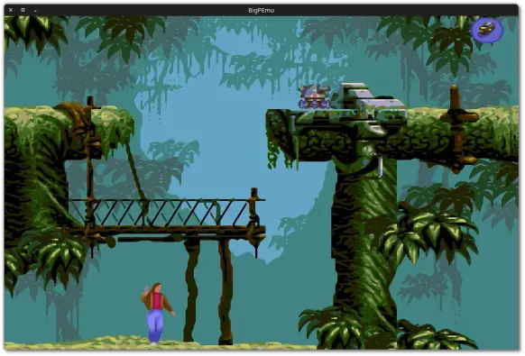 🕶️ A view of its UI (v.1.21, on Linux, at 1280x1024x24, with the xbr-lv3-multipass filter) with the game “Flashback - The Quest for Identity,” a futuristic 2D platform adventure game. The player is in a tropical forest under a wooden platform, armed with a pistol. He must climb onto a platform where a dreaded enemy robot is waiting.

📚️ BigPEmu is a free, multiplatform emulator for the ATARI Jaguar console. It offers 100% full-speed compatibility, HLE BIOS (no external BIOS required), overclocking/underclocking of each Jaguar core, speed and precision adjustment of other system components, fast forward/rewind, state saving, Jaguar CD support, HDR screens, graphic effects (smoothing filters, CRT screen simulation, etc.), custom display cropping, multiple screens, stereoscopic rendering, Jaguar VR, multiplayer (2 to 8 via JagLink support), scripts and plugins, custom languages, gamepads (with mapping), and custom boot ROM images.