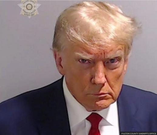 The screenshot of Trump's mug shot (https://www.bbc.com/news/world-us-canada-66612345) reads: "Fulton County Sheriff's Office."