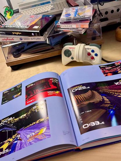WipEout Futurism: The Graphic Archives, a hardback book sitting on a table