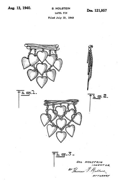 lapel pin shaped like nine hearts hanging from two sticks