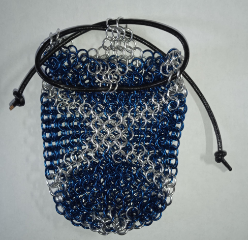 Empty chain mail dice bag in blue and white, designed as the Scottish Saltire flag