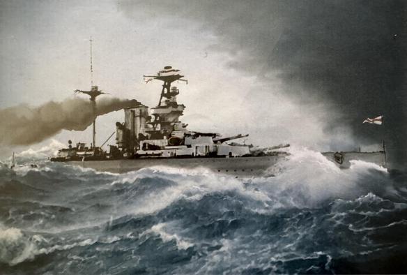 Large British battleship is seen smashing through heavy storm waves during World War II. Battleship is grey with smoke coming out of the funnel Picture is dominated by deep Grays and blues.