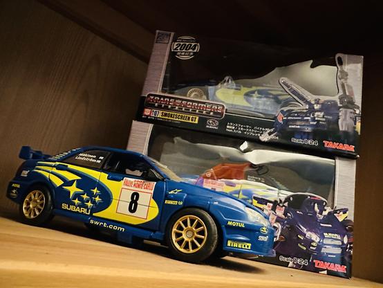 Three different versions of the Transformers WRC WRX rally car from the Alternators/Binaltech line, in a slightly more dynamic layout than the other photo in this post.