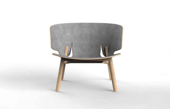 Modern elephant-shaped chair with a curved gray felt backrest and light wooden legs, showcasing minimalist design and ergonomic features.