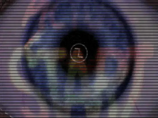 Still shot from the intro video. Close-up on an eye, crazy movement.