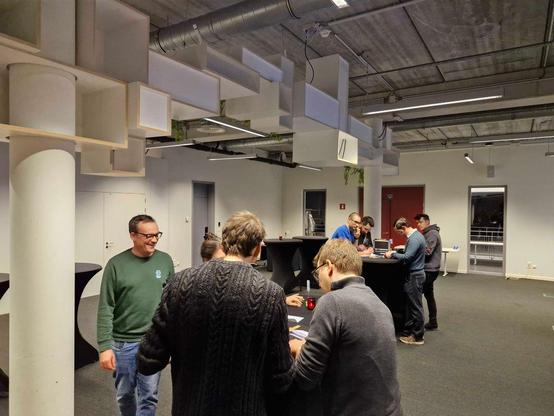 Attendees playing the escape game