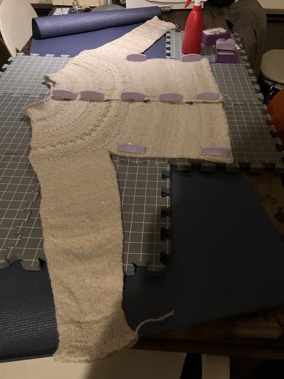 My cardigan on the blocking mats. Not enough mats but the sleeves will be ok