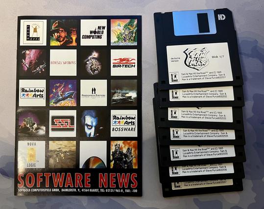 A booklet „software news“ and 7 floppies containing the game