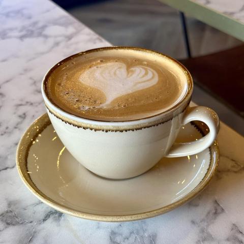 A cup of latte at Roscoes Bakery on Queens Drive in Liverpool.