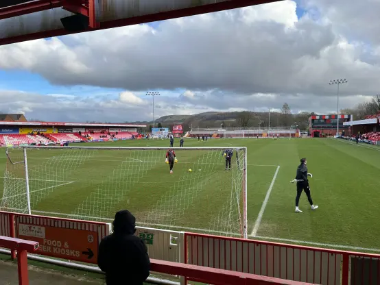 View across the pitch from the Clayton end at the Crown Ground in Accrington