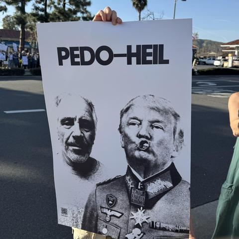 Sign featuring an image of Jeffrey Epstein on the left and Trump dressed in a WWII-era Wehrmacht uniform on the right under the words “Pedo”, “Heil” San Juan Capistrano, CA 2026-01-30