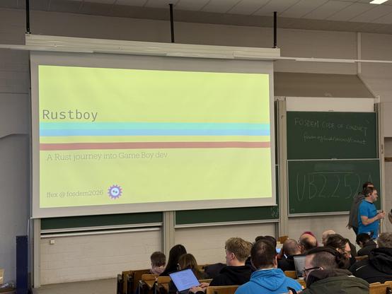 Photo of a screen with a yellow background and the title Rustboy.